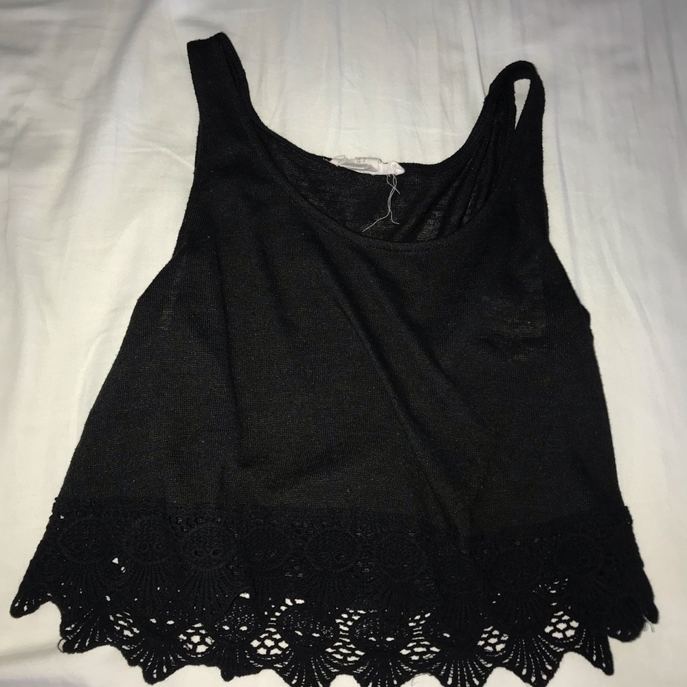Black tank top with floral prints on the bottom